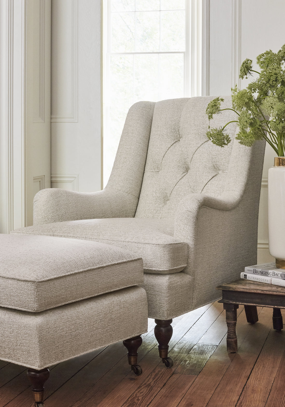 Newport Wing Chair and Brookline Ottoman in Shiloh woven fabric in heather linen color - pattern number W789113 - by Thibaut in the Reverie collection