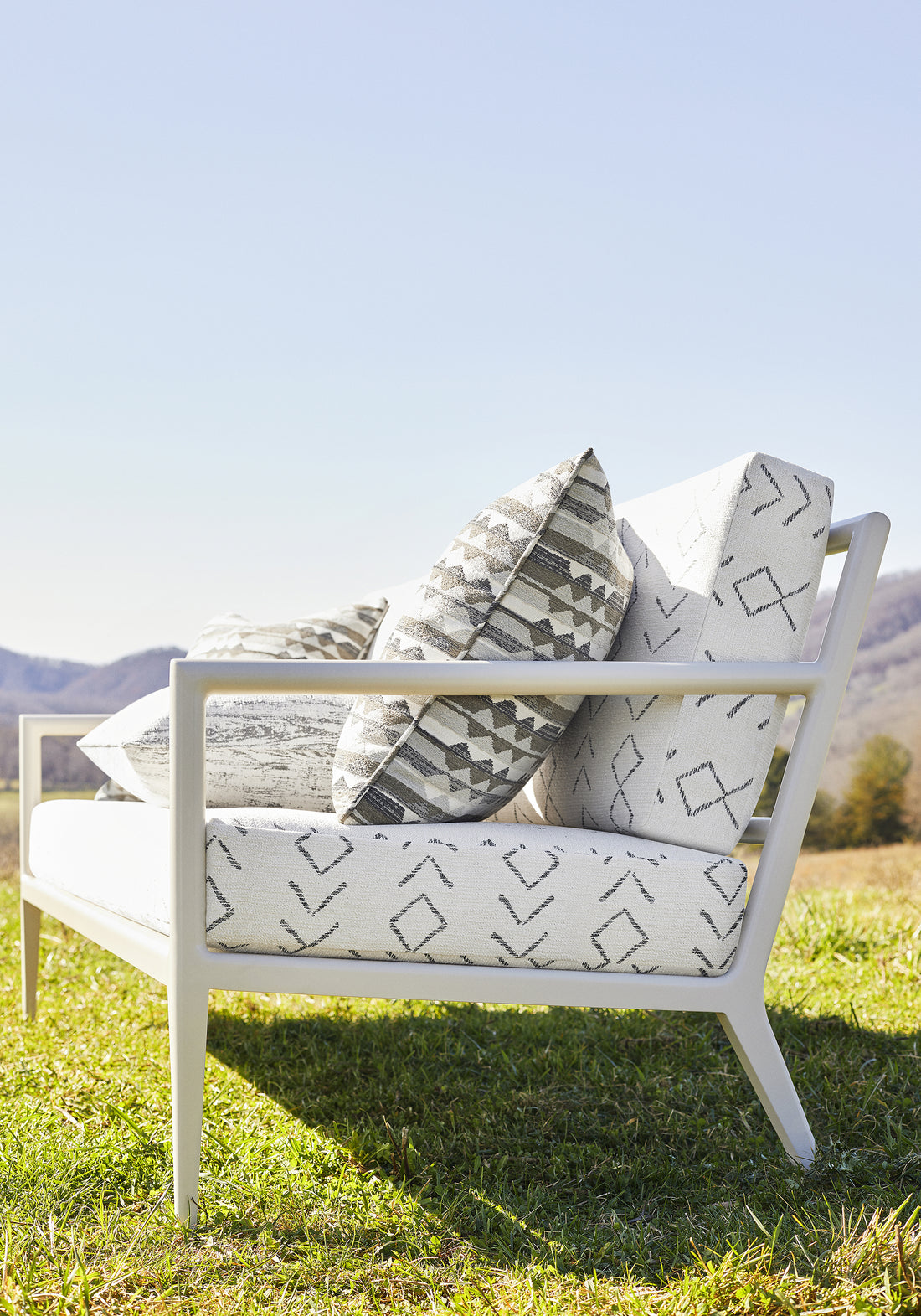 Outdoor pillows made with Saranac woven fabric in Hickory color - pattern number W78375 - by Thibaut in the Sierra collection