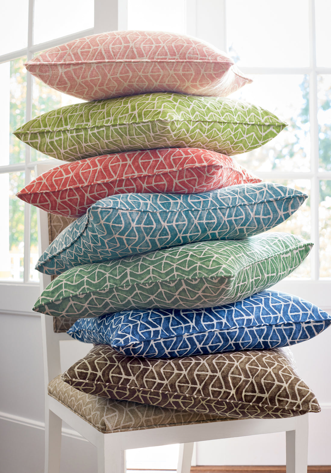 Fabric color examples showing pillow made with Stony Brook fabric in navy color - pattern number F942007 - by Thibaut