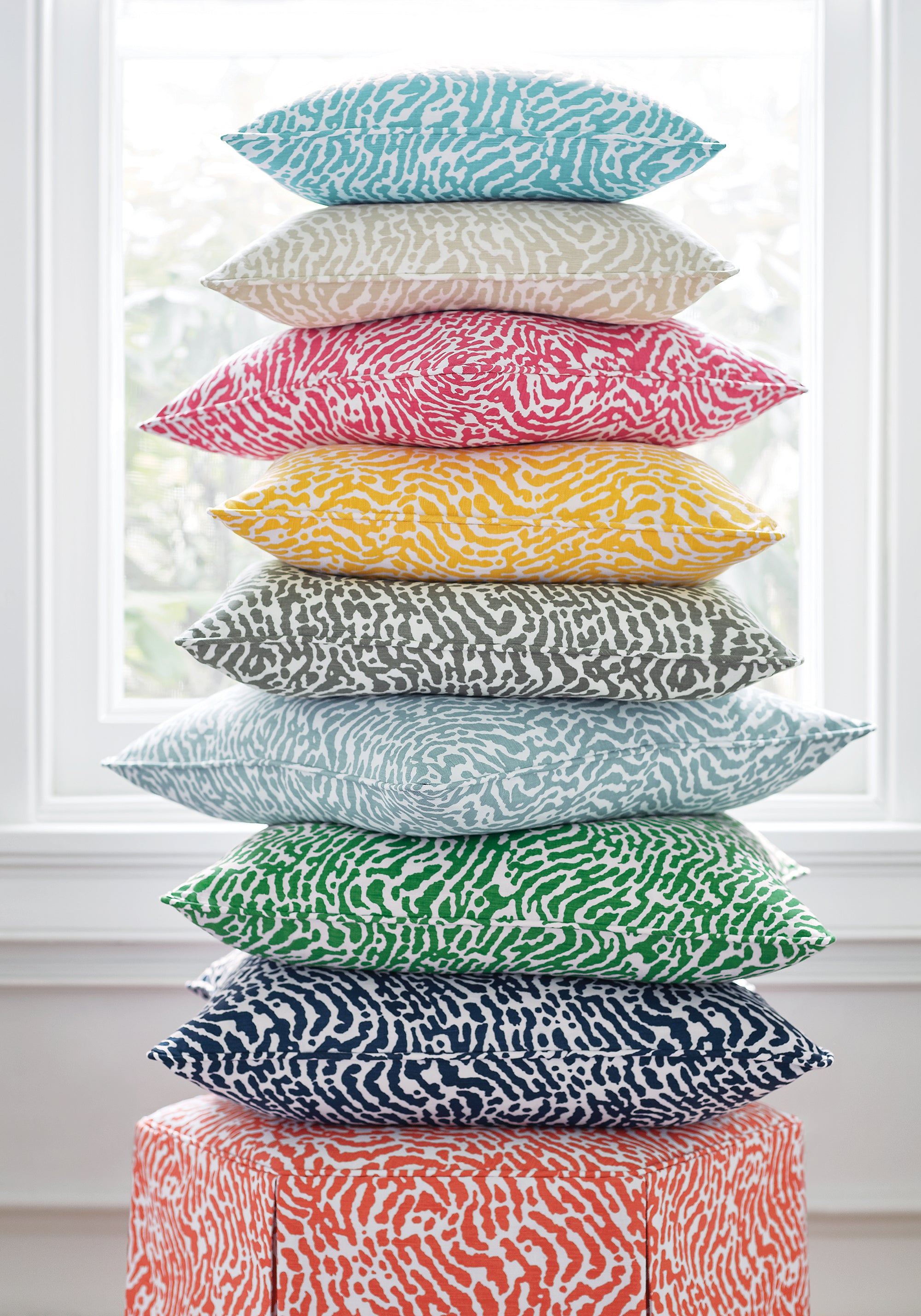 Entire collection of St. Croix printed fabric pillows and For the Hex of it Ottoman, featuring navy color - pattern number F913151 - by Thibaut in the Summer House collection