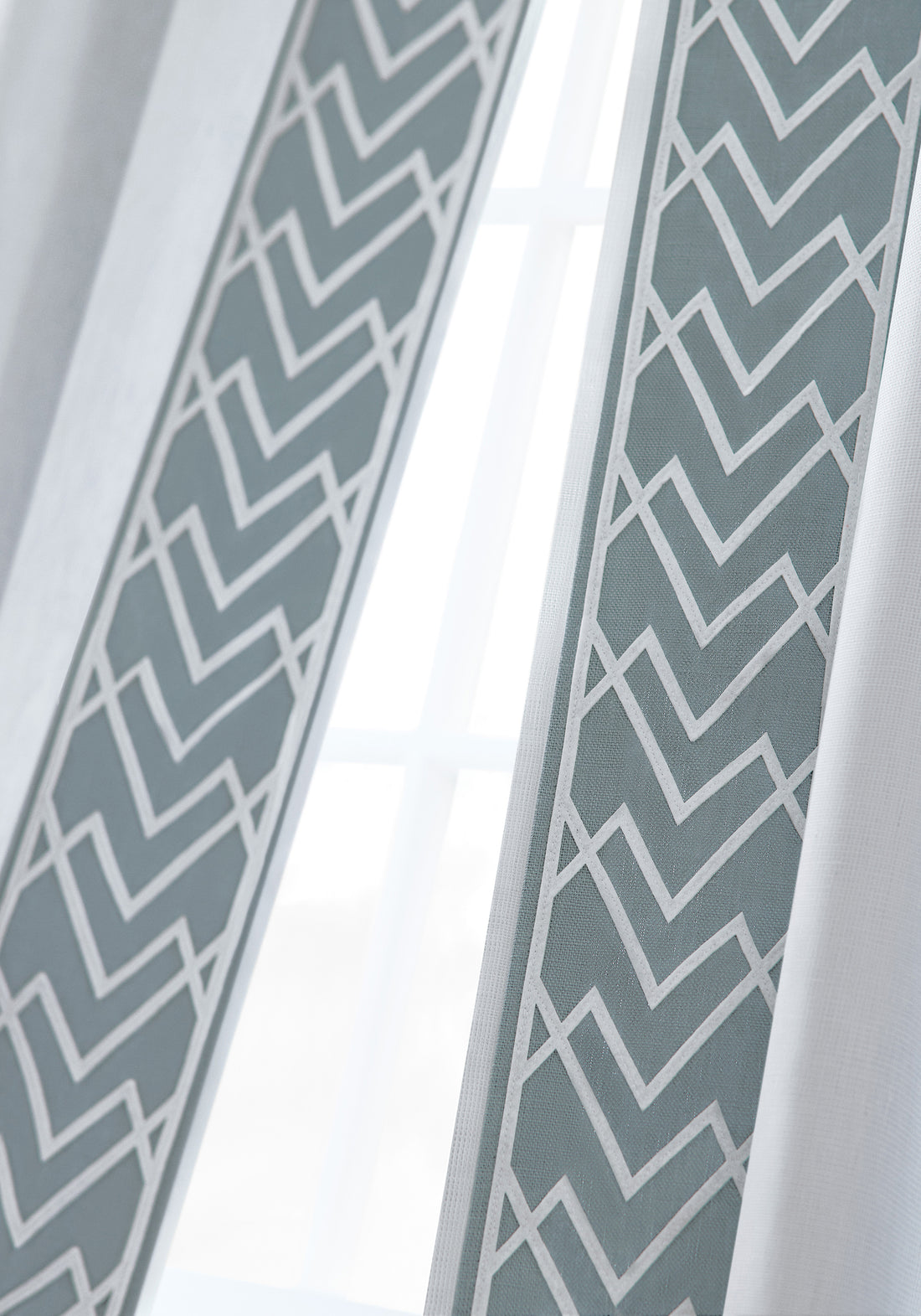 Skye Linen wide woven fabric drapes in mist color with Summit applique tape - pattern number FWW7618 - by Thibaut in the Palisades collection