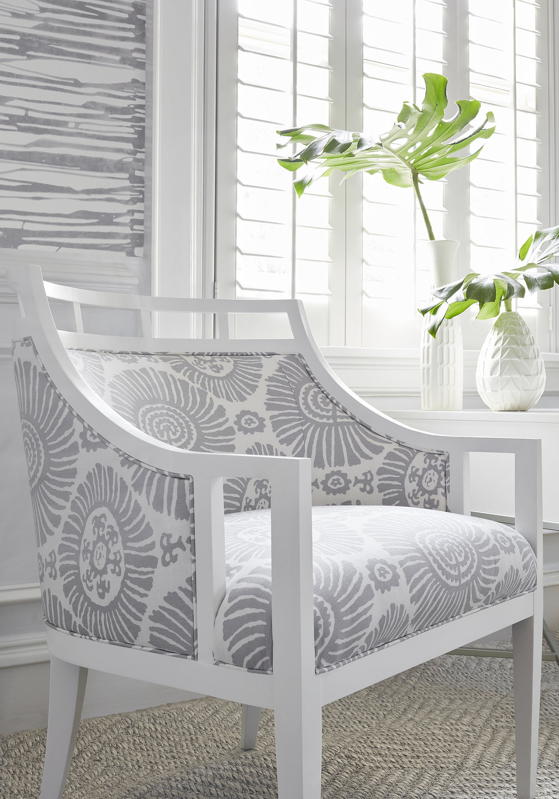 Light grey colored Malibu Chair in Solis printed fabric, pattern number F910082, of Thibaut&