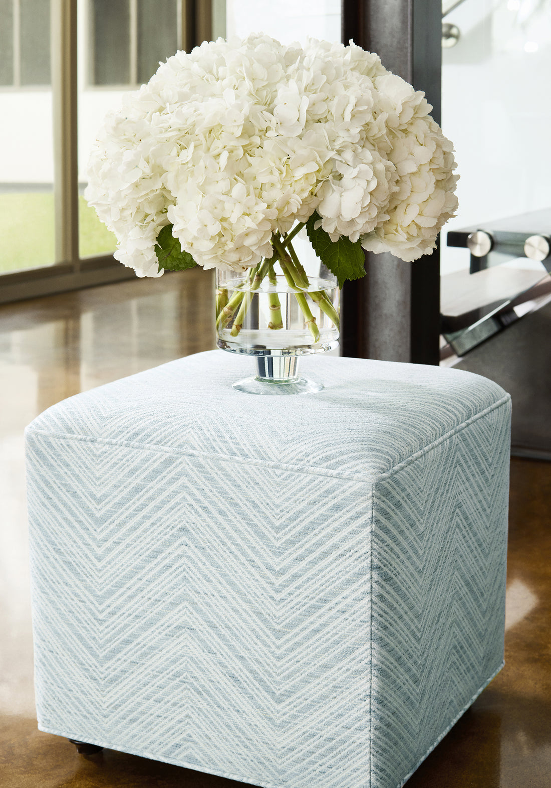 Fair and Square Ottoman in Monti Chevron woven fabric in ocean color variant detailed view by Thibaut in the Veneto collection - pattern number W77137