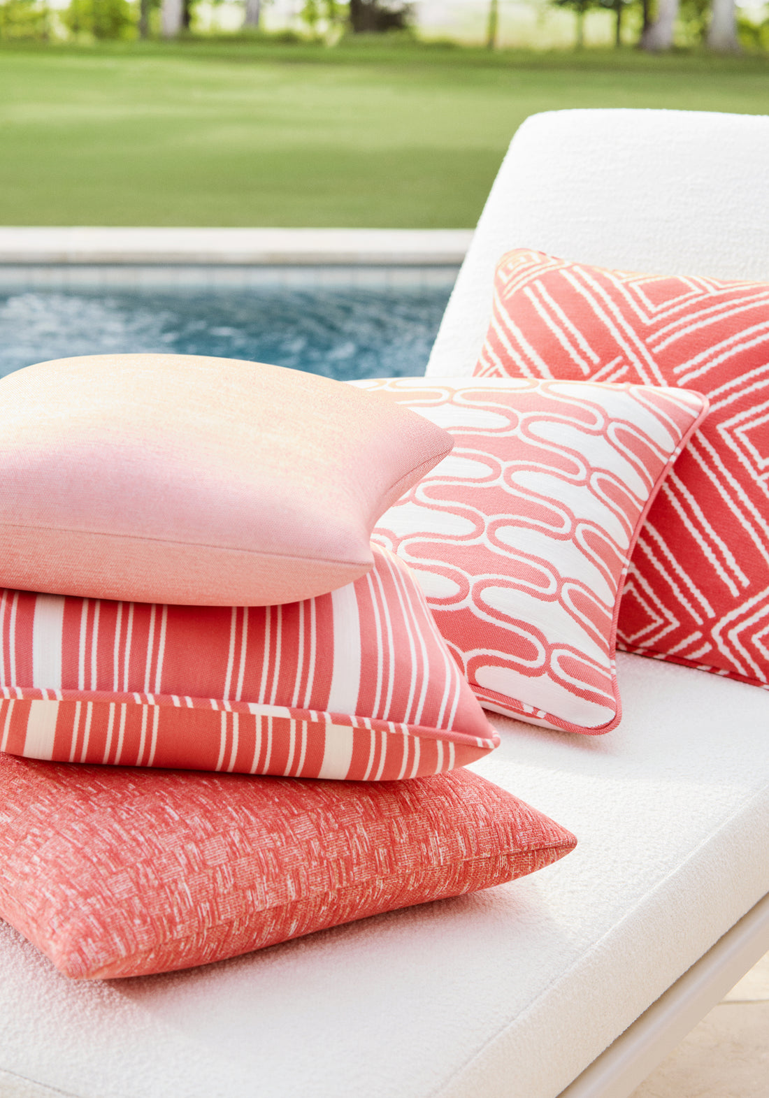 Pillow in Clara woven fabric in coral color - pattern number W8595 - by Thibaut in the Villa Textures collection