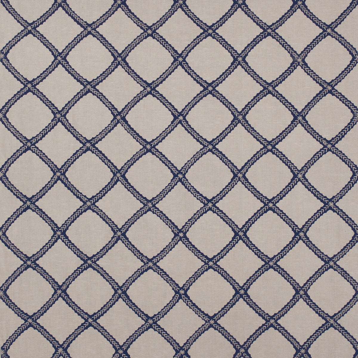Majuli Embroidery fabric in navy on flax color - pattern number W788707 - by Thibaut in the Trade Routes collection