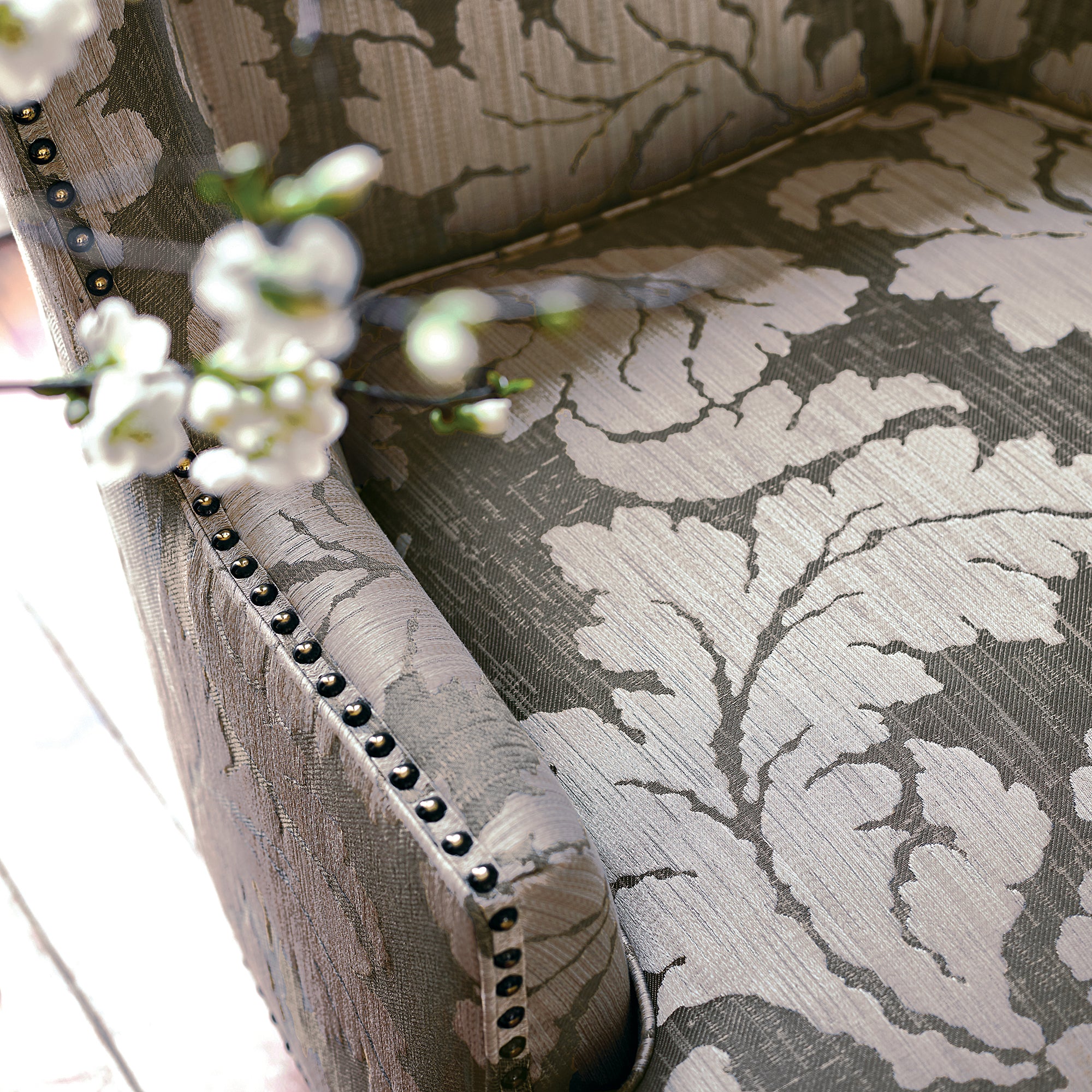Closeup detail of Monterey Wing Chair in Caserta Damask woven fabric in Taupe - pattern number AW72979 - by Anna French
