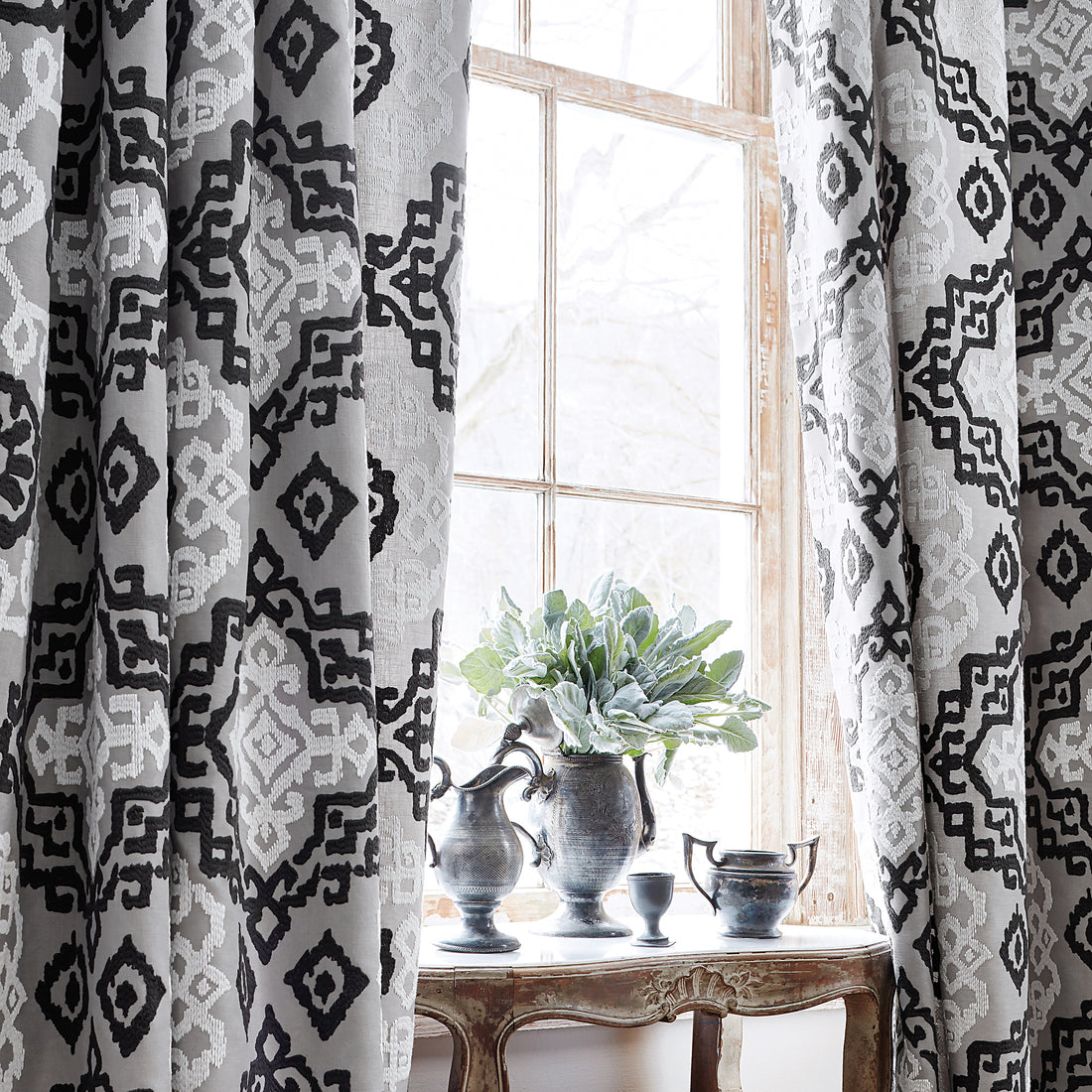 Draperies in Scottsdale Embroidery fabric in grey and black color - pattern number AW73018 - by Anna French in the Meridian collection
