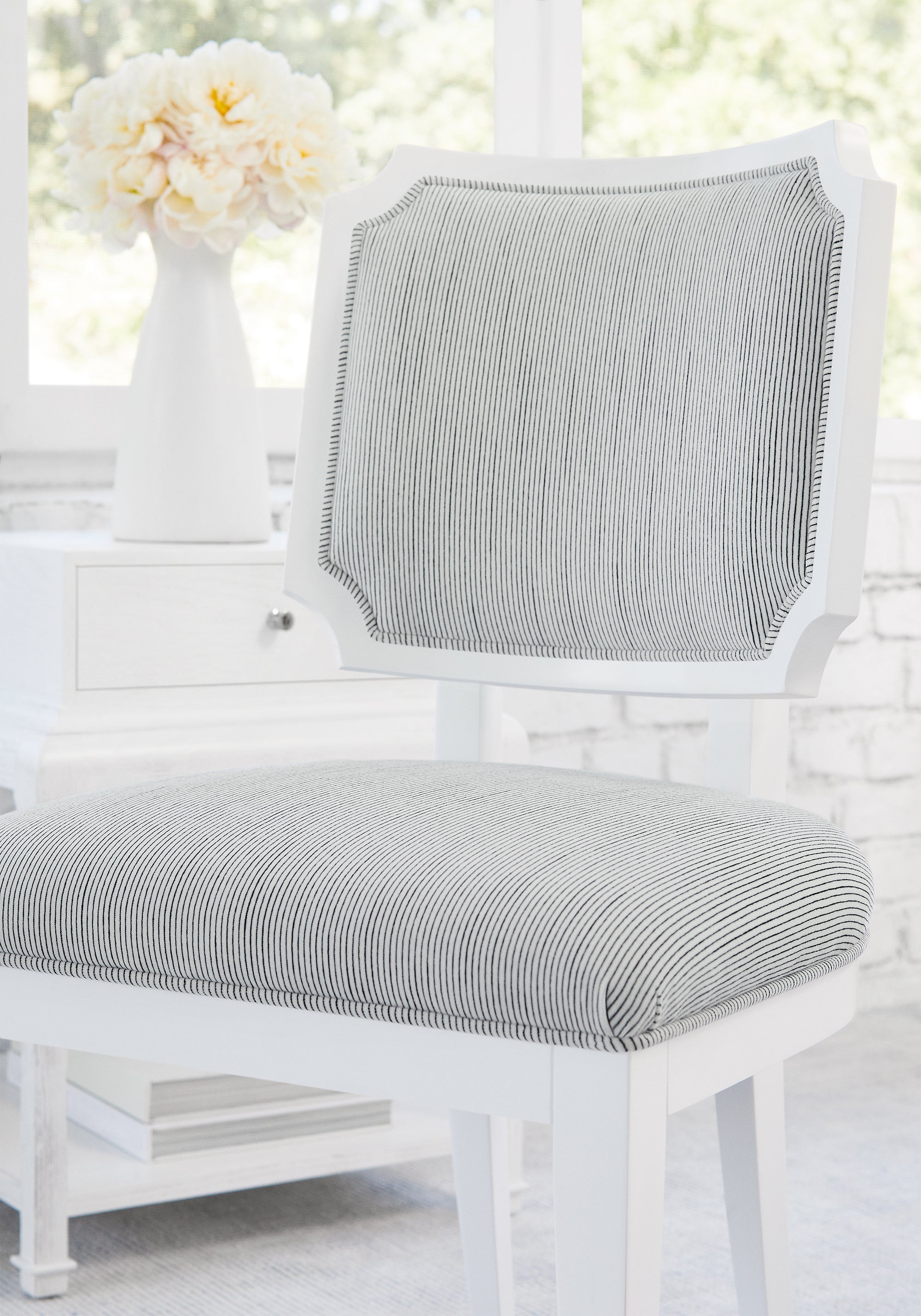 Detailed view of Kelby Dining Chair in Fino Velvet woven fabric in domino color - pattern number W8148 by Thibaut in the Sereno collection