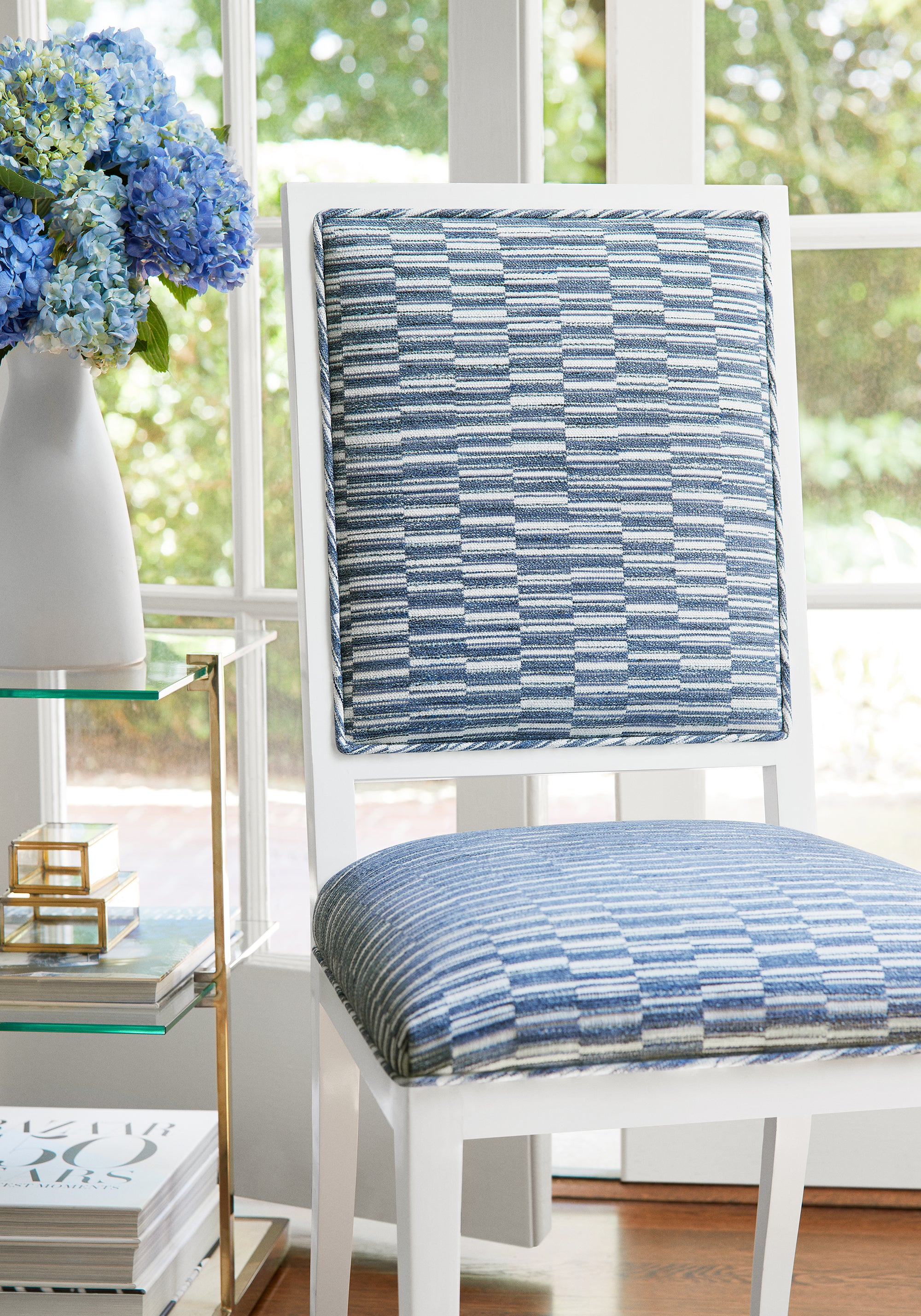 Detailed view of Lauderdale Dining Chair in Legato woven fabric in indigo color - pattern number W8106 by Thibaut in the Sereno collection