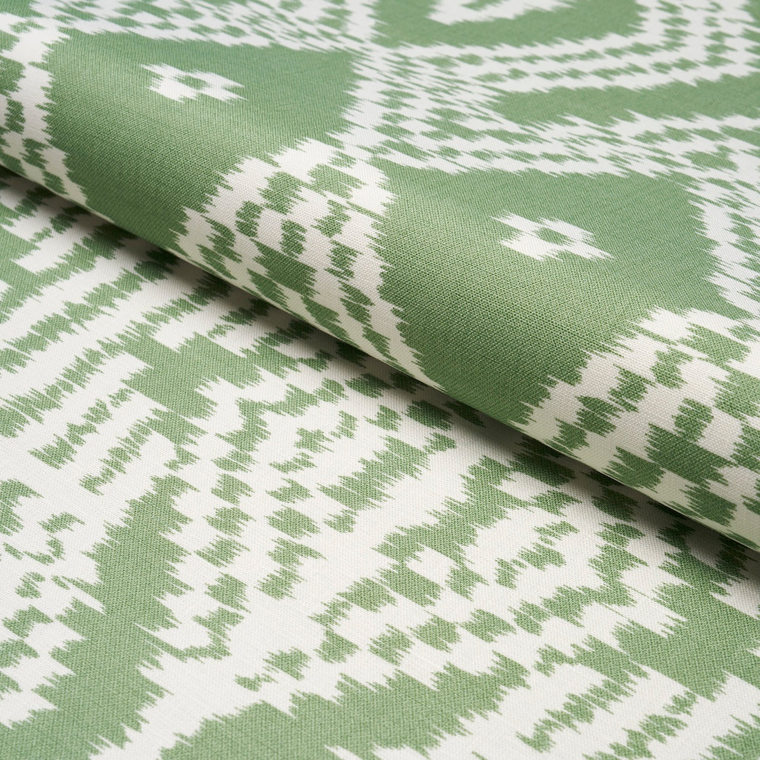 Asaka Ikat fabric in green color - pattern number 176097 - by Schumacher in the Ikat Collection collection