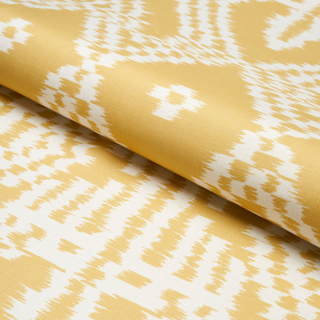 Asaka Ikat fabric in buttercup color - pattern number 176098 - by Schumacher in the Ikat Collection collection