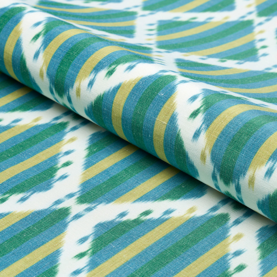 Kai Striped Ikat fabric in green color - pattern number 181291 - by Schumacher in the Ikat Collection collection