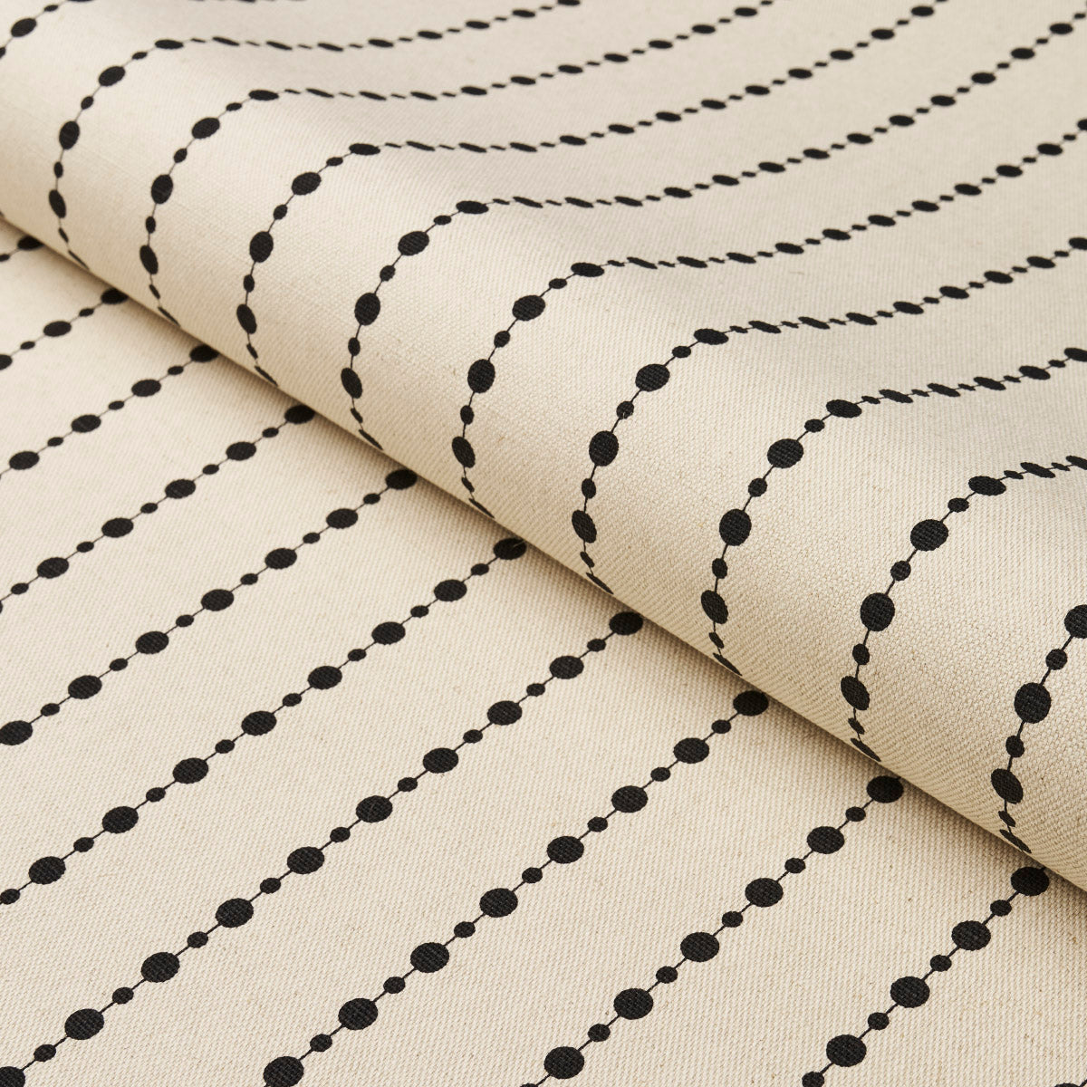 Beaded Stripe fabric in black and cream color - pattern number 181430 - by Schumacher in the Neisha Crosland collection