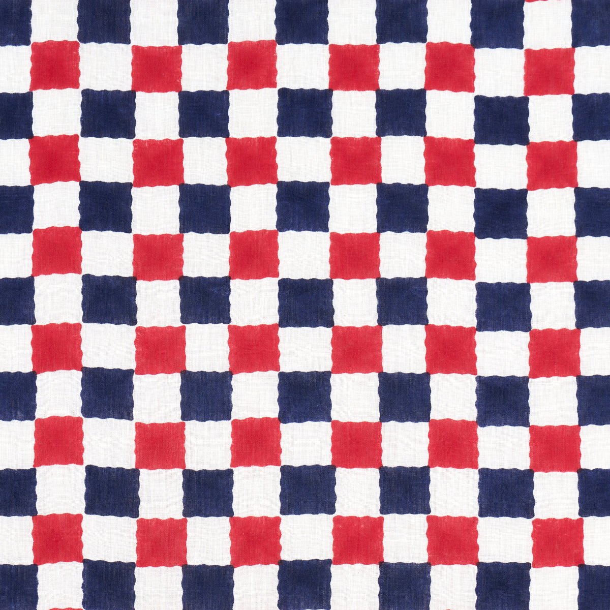 Chequer Hand Block Print fabric in red navy color - pattern number 181792 - by Schumacher in the Molly Mahon collection