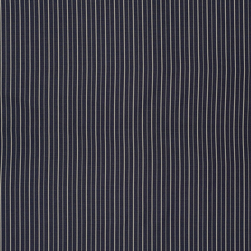 Ostia Stripe Indoor Outdoor fabric in navy and ivory color - pattern number 70890 - by Schumacher in the Riviera Indoor &amp; Outdoor collection
