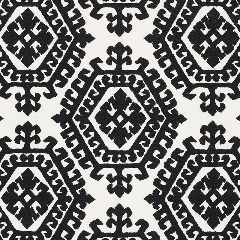Omar Embroidery fabric in black color - pattern number 71942 - by Schumacher in the Caravanne collection