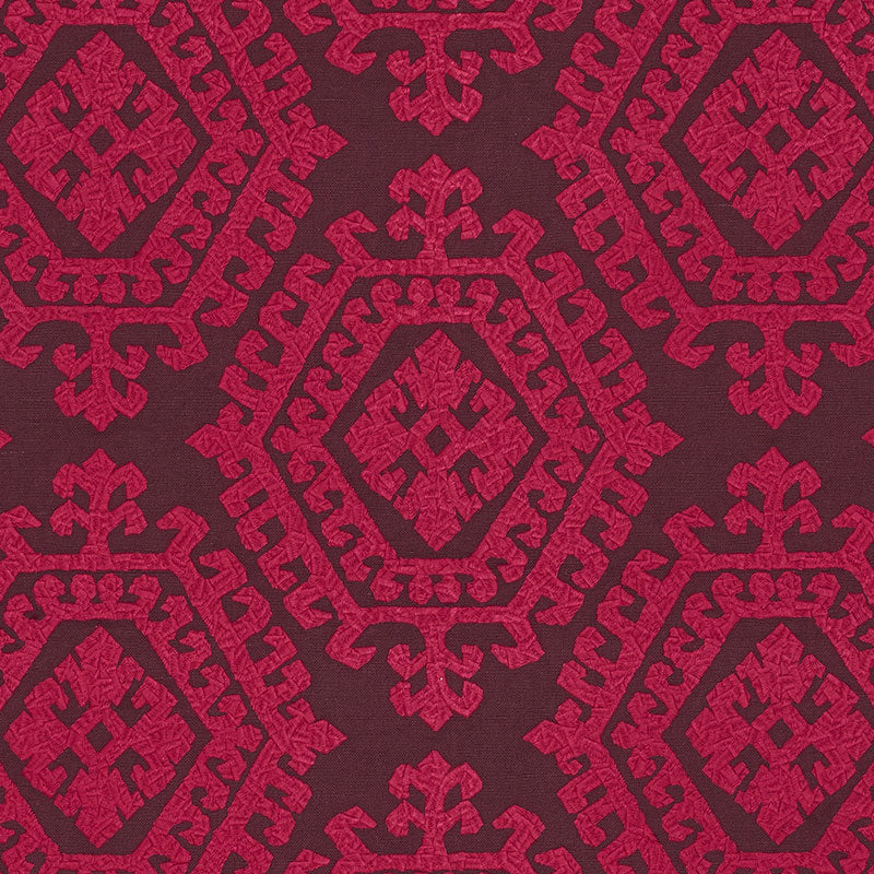 Omar Embroidery fabric in berry color - pattern number 71943 - by Schumacher in the Caravanne collection