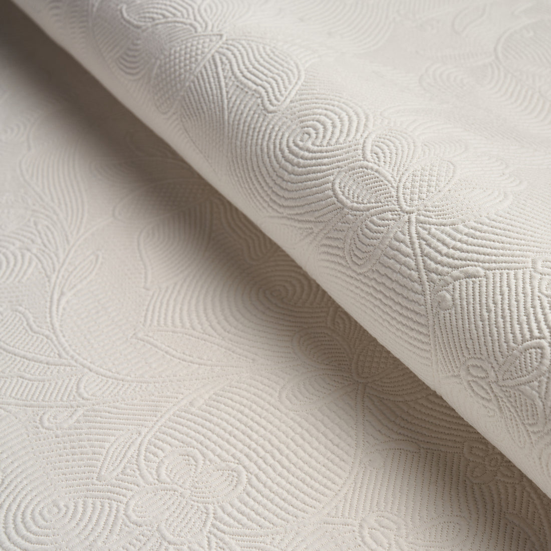 Quilted Scroll Matelasse fabric in ivory color - pattern number 81590 - by Schumacher in the Williamsburg collection