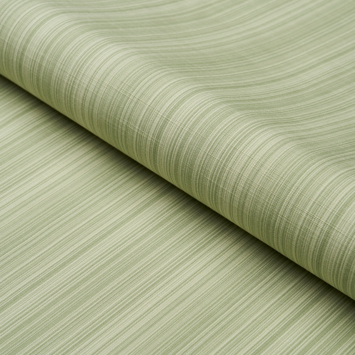 Gracie Solid Strie fabric in leaf green color - pattern number 83720 - by Schumacher in the Mark D. Sikes collection