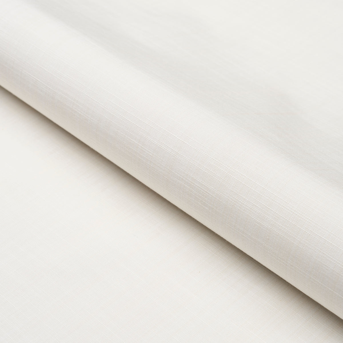 Gracie Solid Strie fabric in ivory color - pattern number 83724 - by Schumacher in the Mark D. Sikes collection