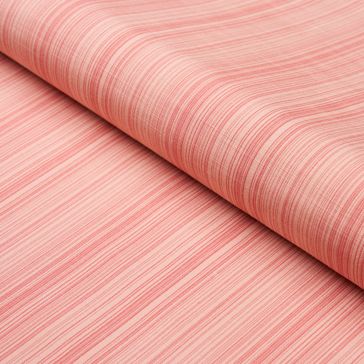 Gracie Solid Strie fabric in faded red color - pattern number 83727 - by Schumacher in the Mark D. Sikes collection