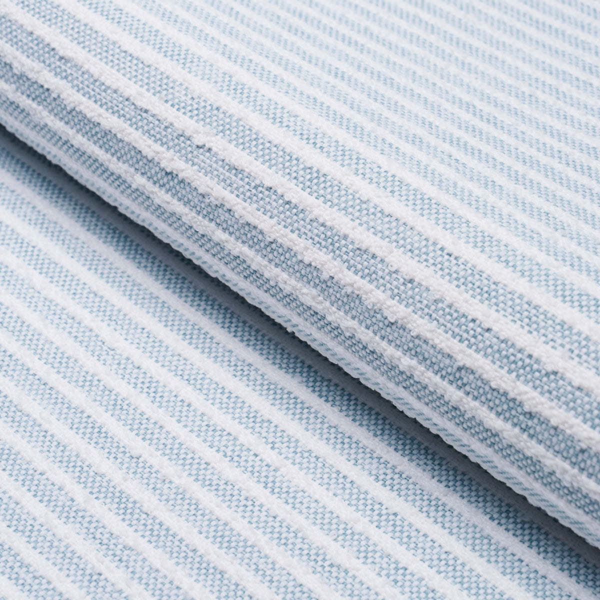 Boucle Stripe Indoor Outdoor fabric in chambray color - pattern number 84260 - by Schumacher in the Live It Up! collection