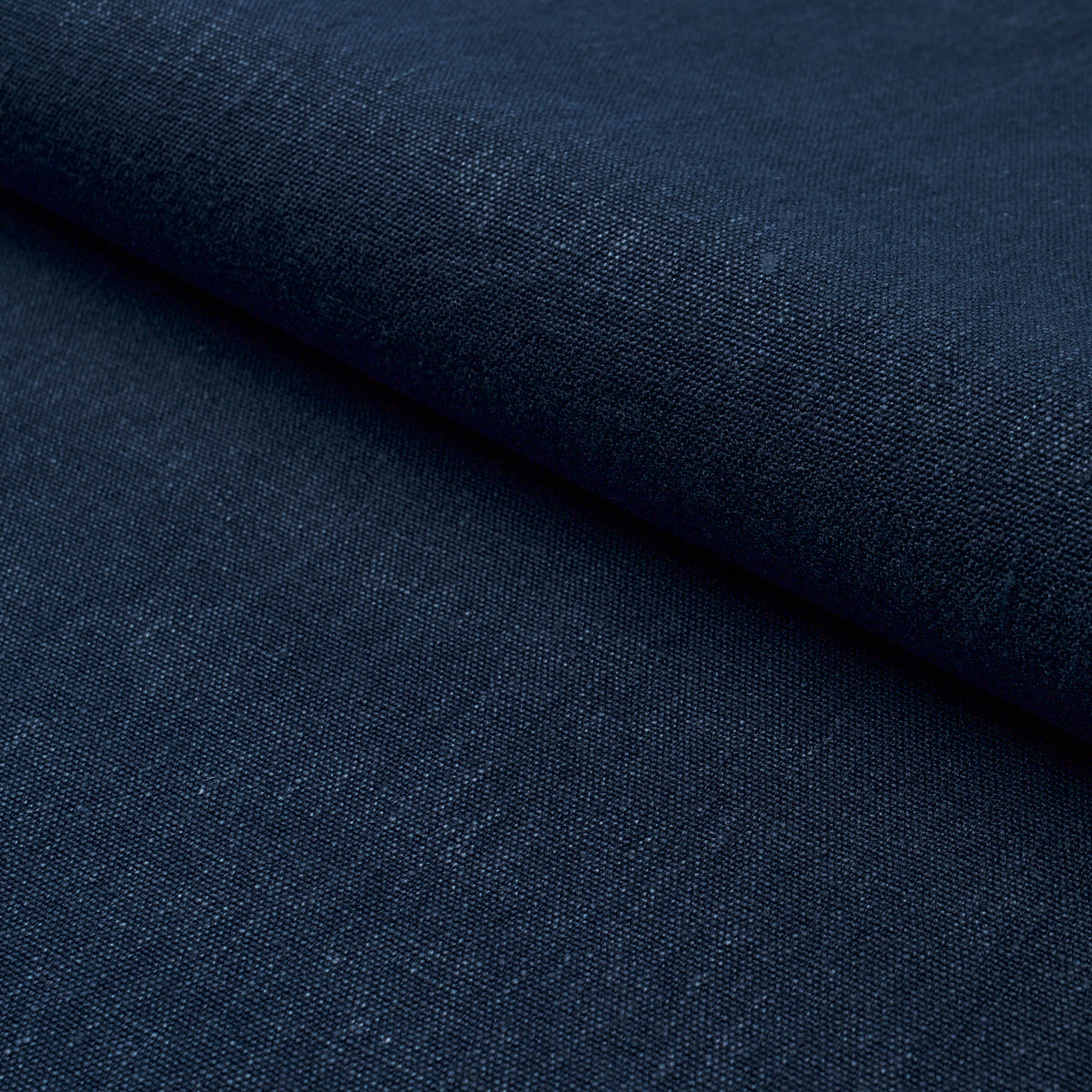 Jumi Stonewashed Linen fabric in navy color - pattern number 84910 - by Schumacher in the Perfect Basics: Linen collection