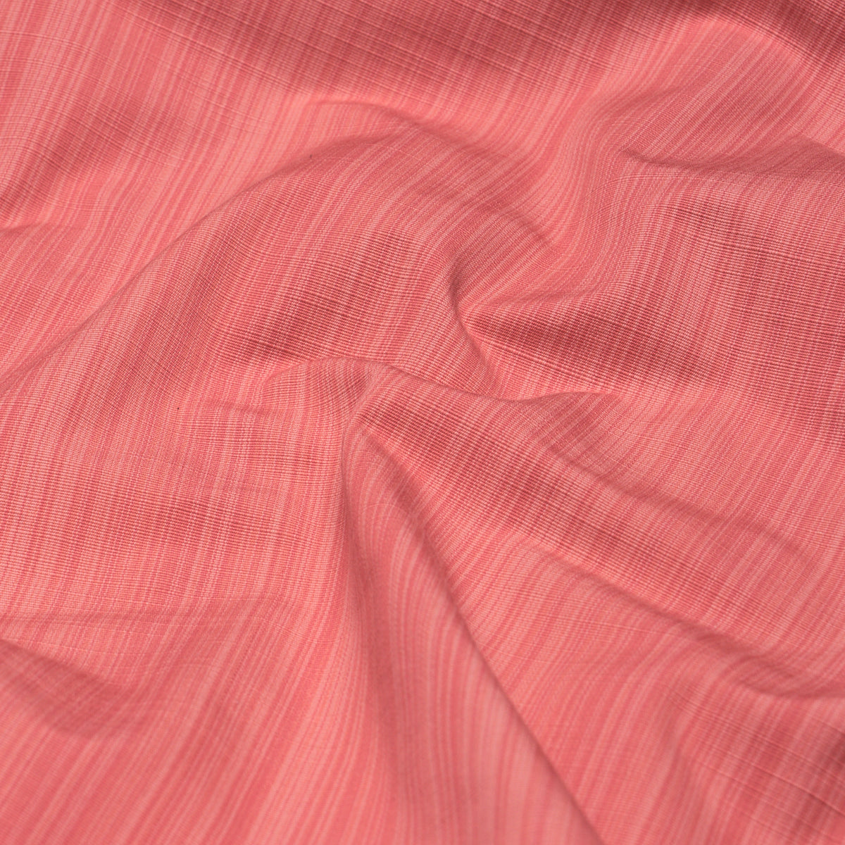 Gracie Solid Strié fabric in coral color - pattern number 85930 - by Schumacher in the Mark D. Sikes collection
