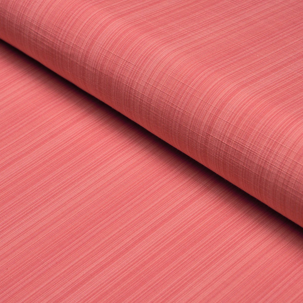 Gracie Solid Strié fabric in coral color - pattern number 85930 - by Schumacher in the Mark D. Sikes collection