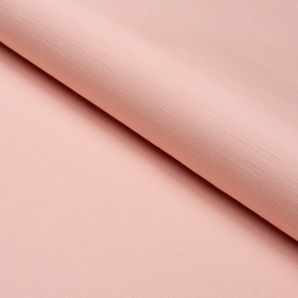 Judy Texture fabric in peach color - pattern number 85940 - by Schumacher in the Mark D. Sikes collection