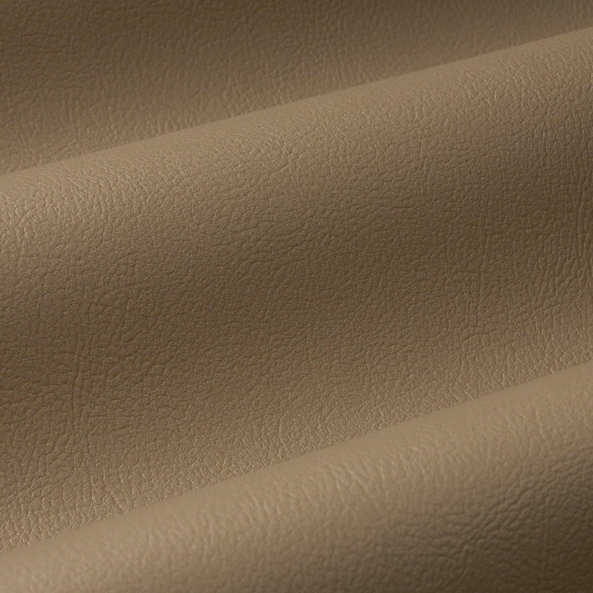 Vegan Leather Indoor/Outdoor fabric in warm metallic color - pattern number 87050 - by Schumacher in the Perfect Basics: Vegan Leather &amp; Suede collection