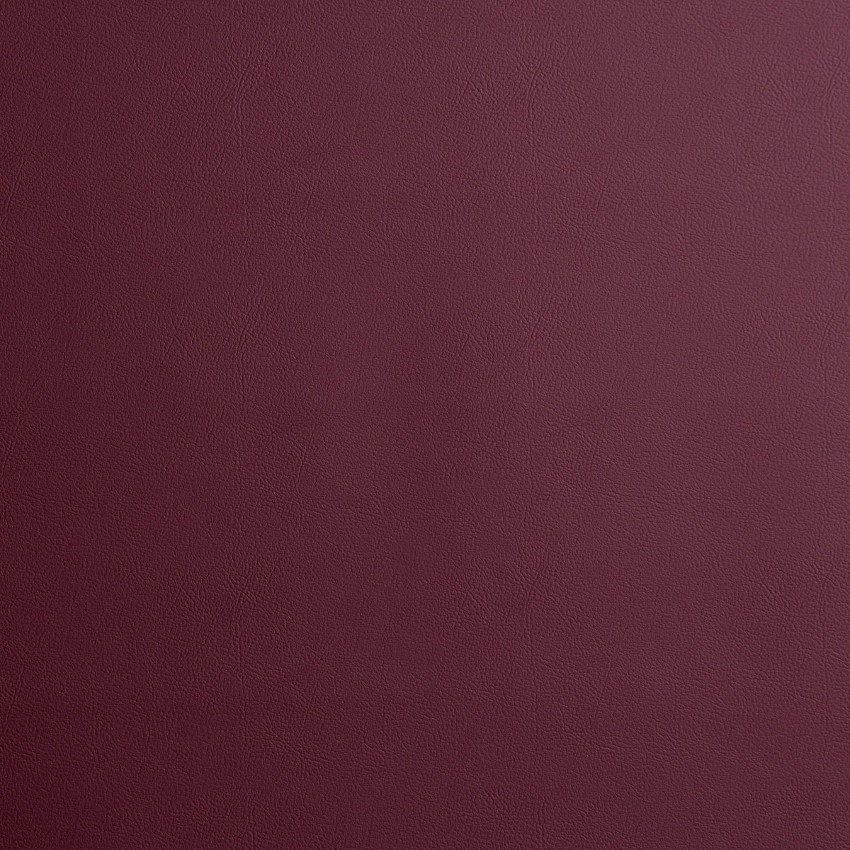 Vegan Leather Indoor/Outdoor fabric in merlot color - pattern number 87052 - by Schumacher in the Perfect Basics: Vegan Leather &amp; Suede collection