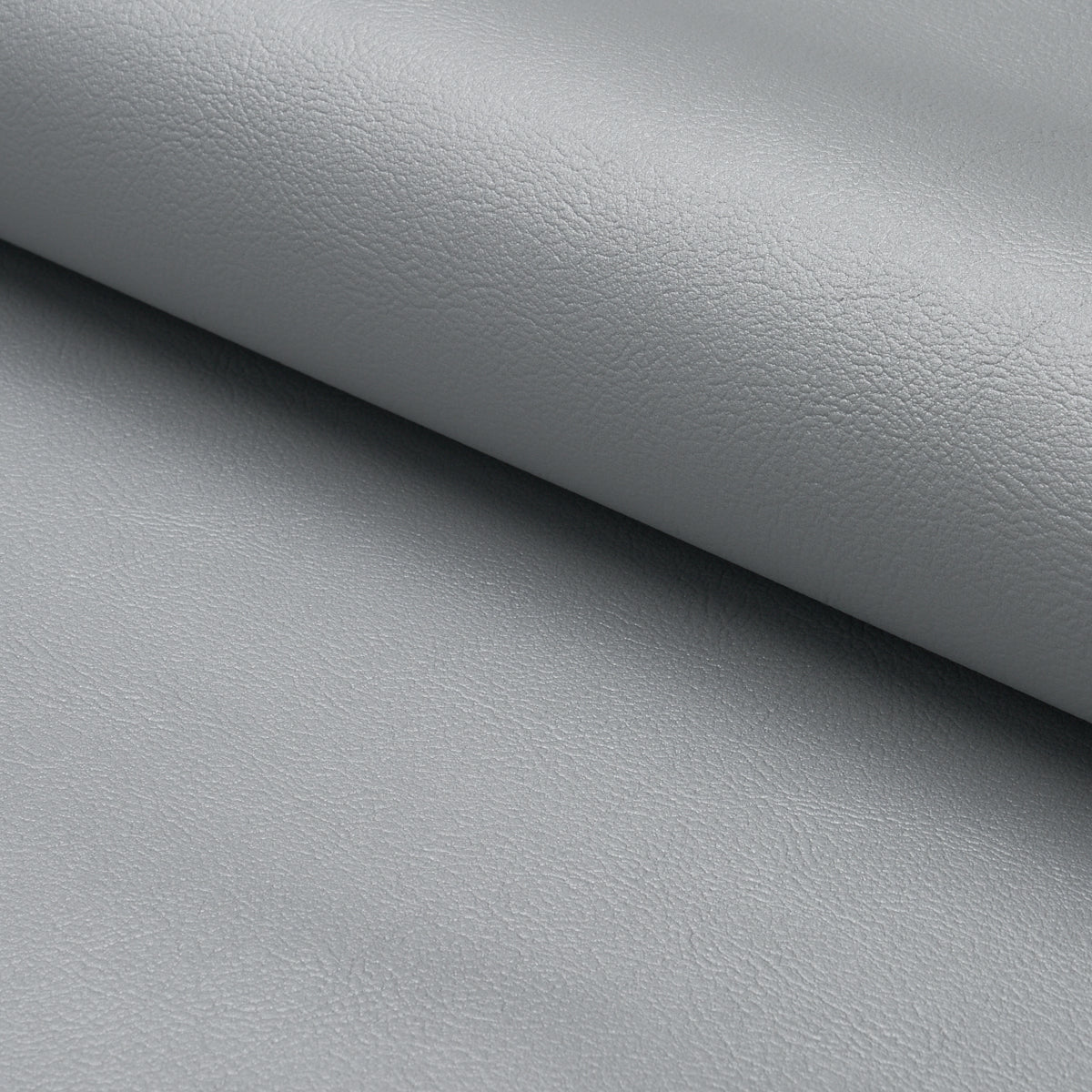 Vegan Leather Indoor/Outdoor fabric in silver metallic color - pattern number 87057 - by Schumacher in the Perfect Basics: Vegan Leather &amp; Suede collection