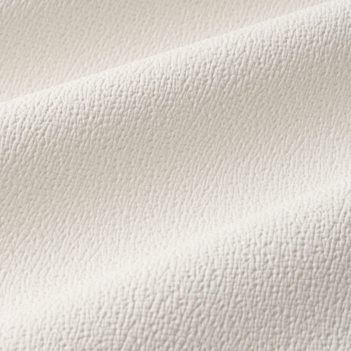 Textured Vegan Leather fabric in ivory color - pattern number 87300 - by Schumacher in the Perfect Basics: Vegan Leather &amp; Suede collection