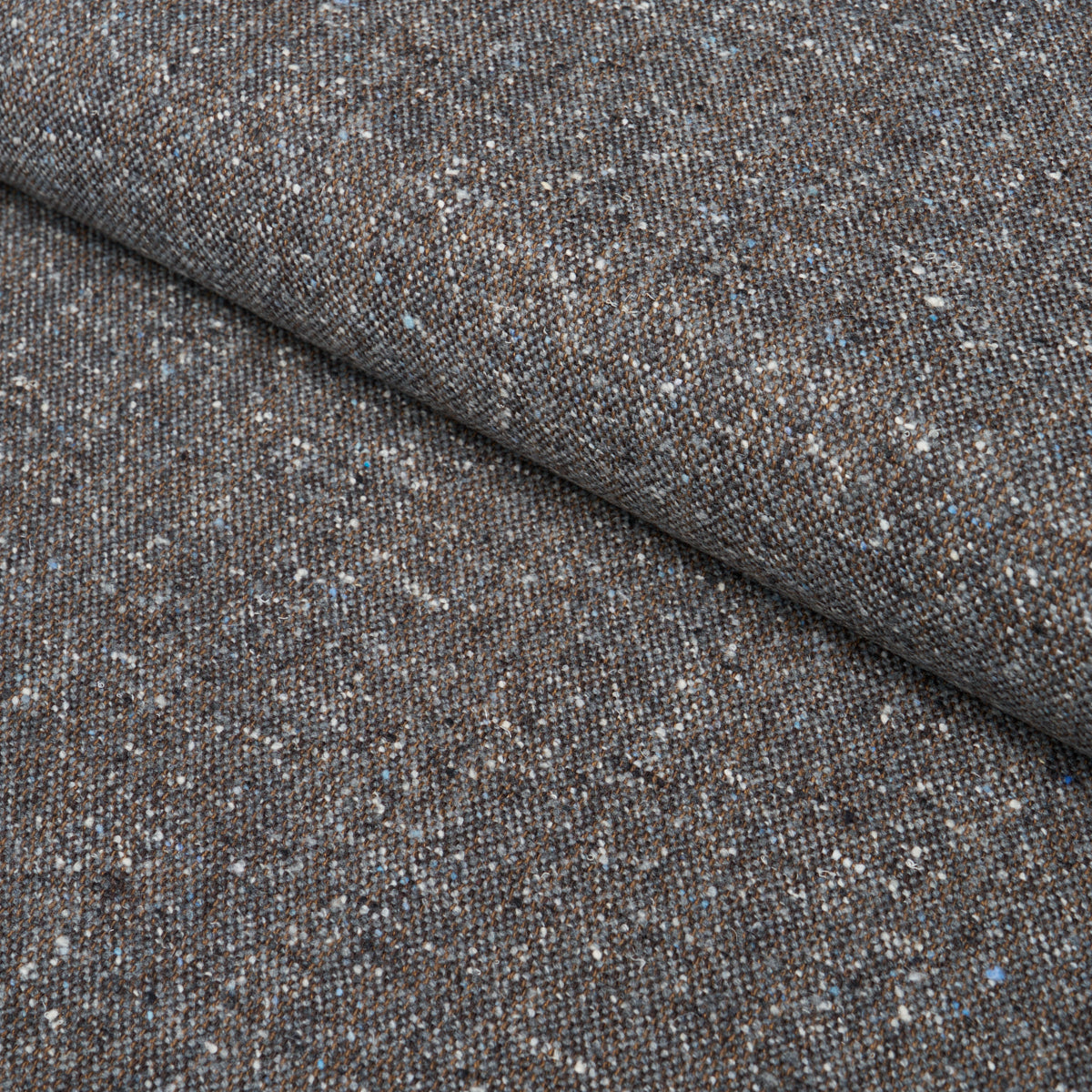Clarke Donegal Wool Blend fabric in Dark Grey color - pattern number 87314 - by Schumacher in the Patterson Flynn collection