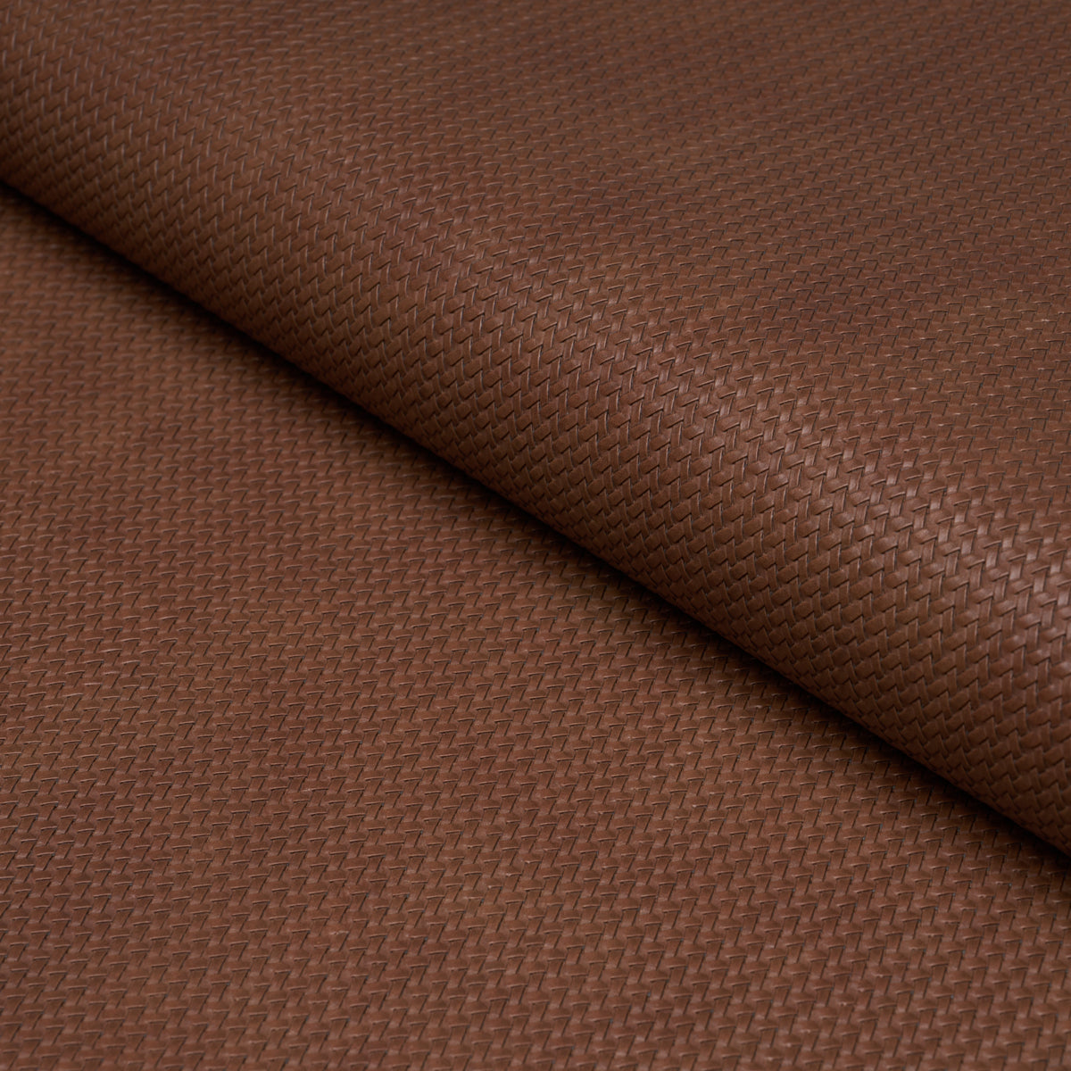 Vegan Leather Rattan Indoor/Outdoor fabric in Chocolate color - pattern number 87804 - by Schumacher in the Essentials: Small Scale Upholstery Fabrics collection