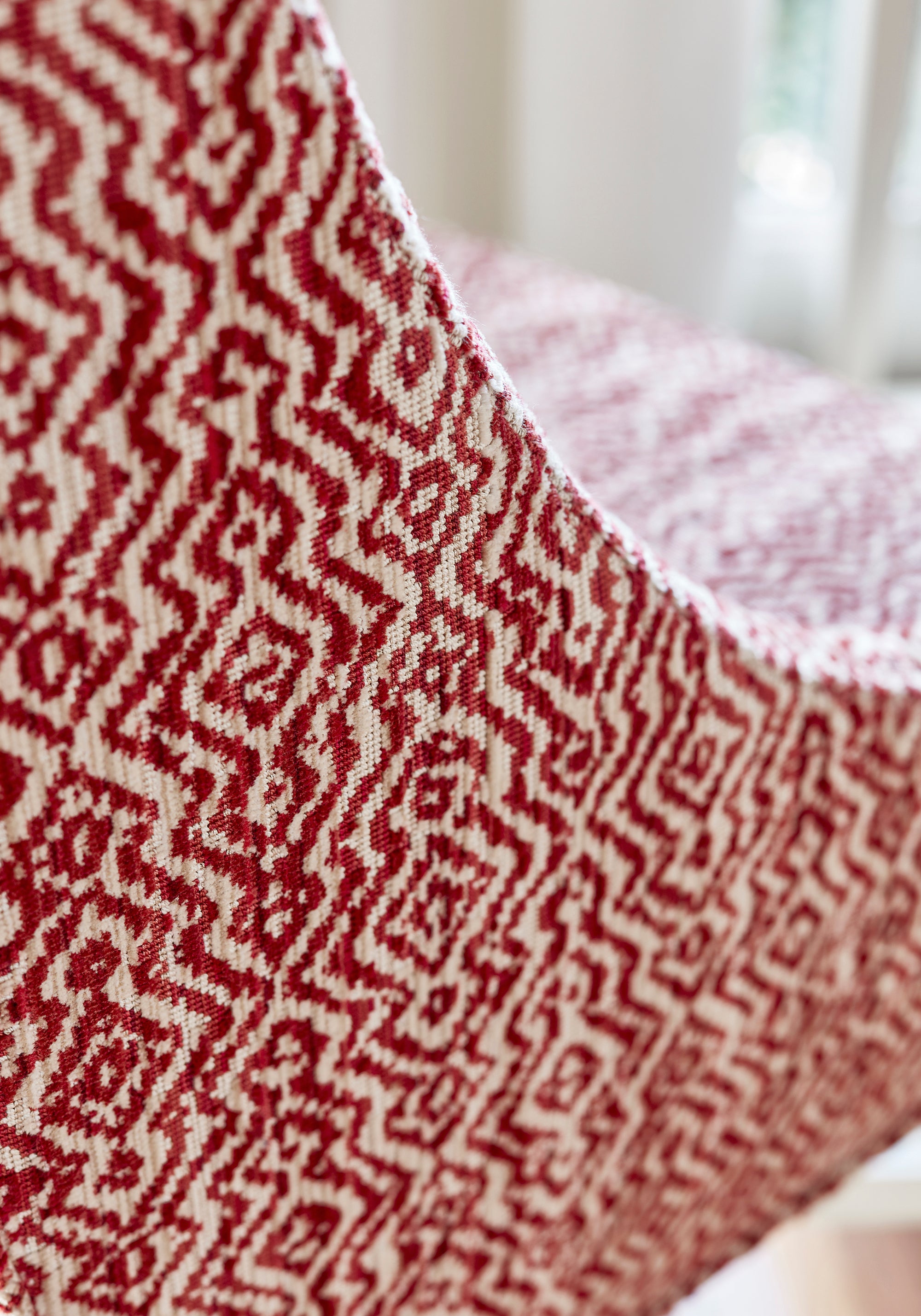 Detailed view of Hayden Dining Chair in Anstasia woven fabric in cardinal color - pattern number W80690 by Thibaut in the Woven Resource Vol 11 Rialto collection