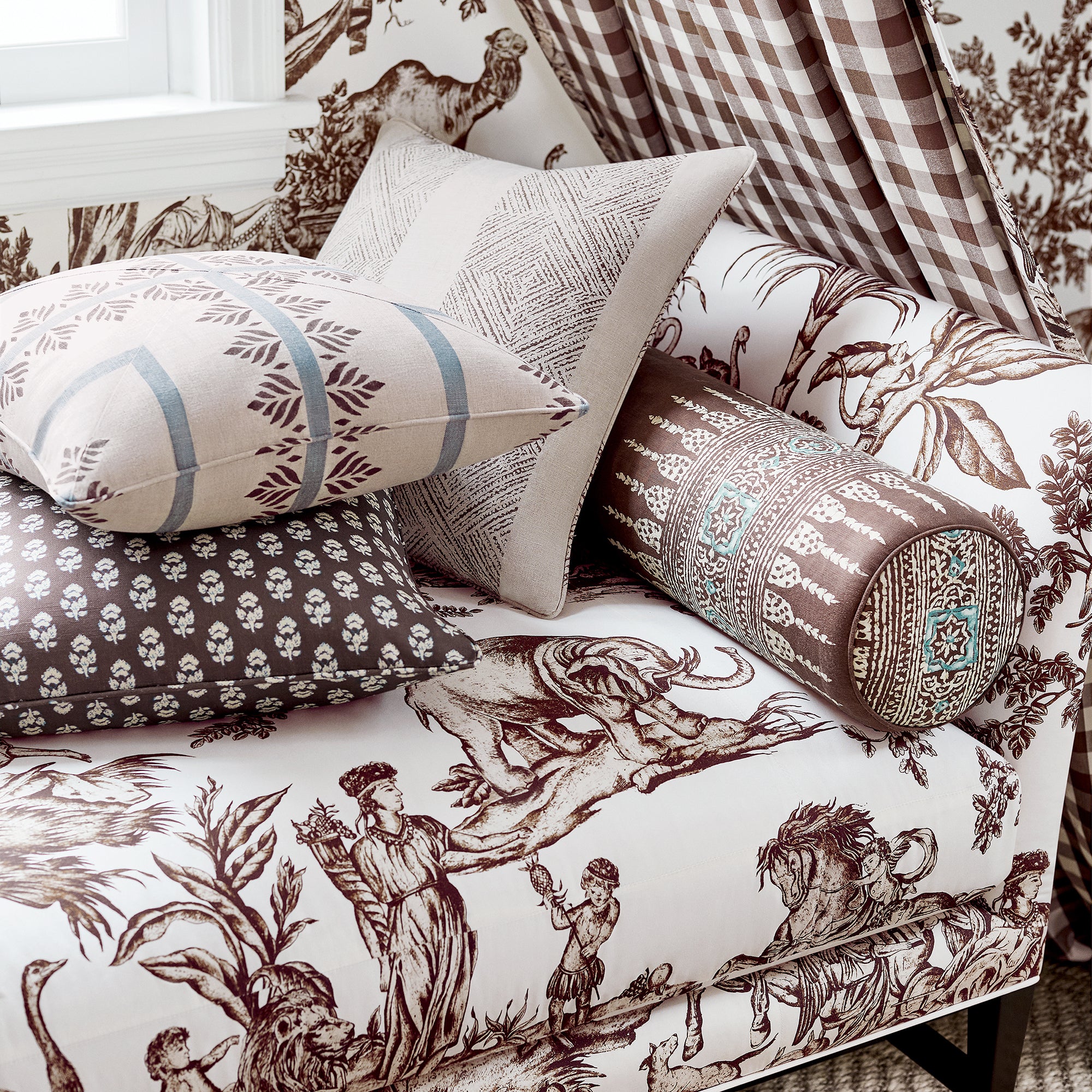 Closeup of Addison Daybed in Antilles Toile printed fabric in Brown - pattern number AF15169 - by Anna French in the Antilles collection