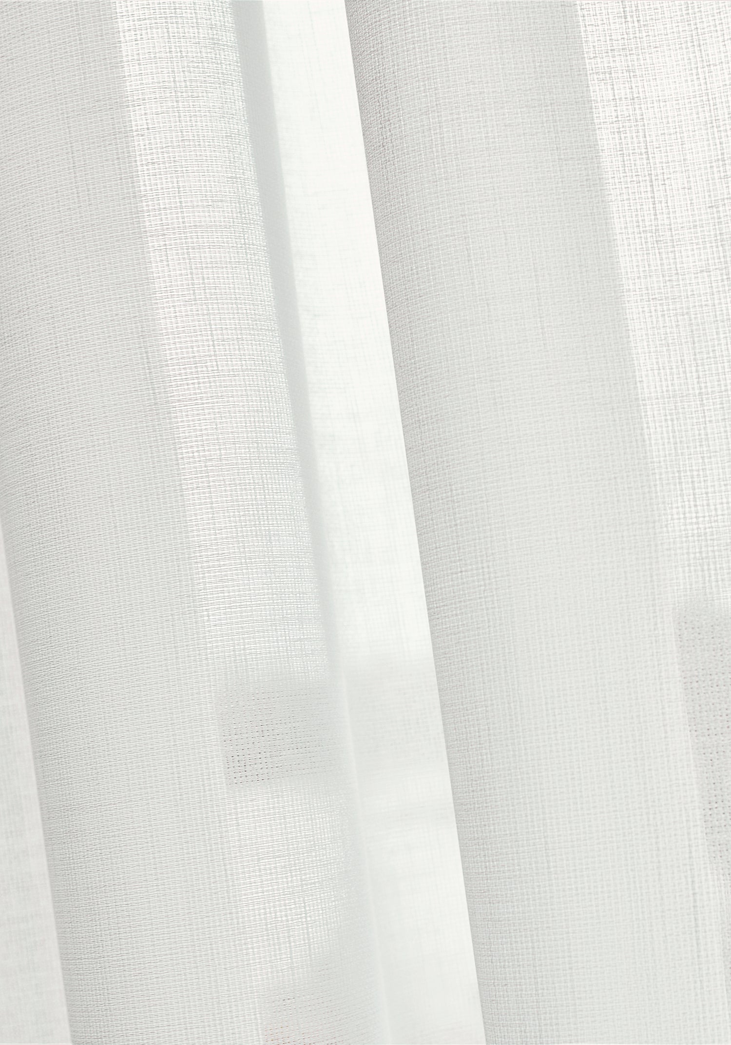 Sheer drapery curtains made with Thibaut Abbot woven fabric in Snow White color, pattern FWW7144