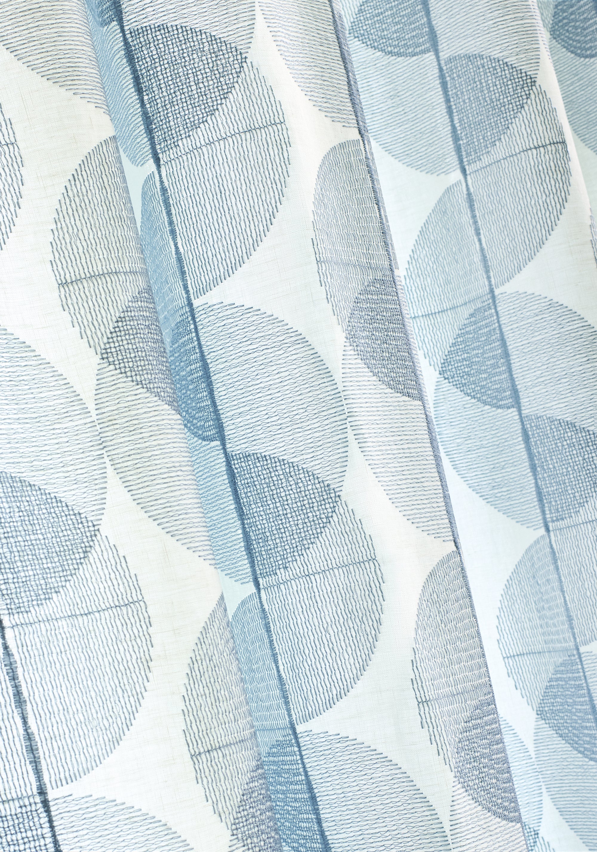 Up close sheer in Cyclone Embroidery fabric in ocean color - pattern number FWW8256 - by Thibaut in the Aura collection