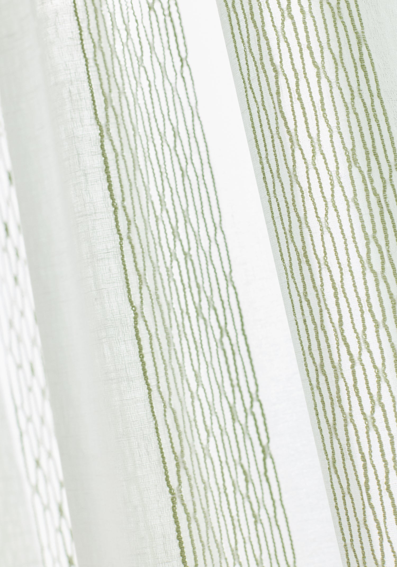 Up close sheer in Cypress Stripe fabric in aloe color - pattern number FWW8266 - by Thibaut in the Aura collection