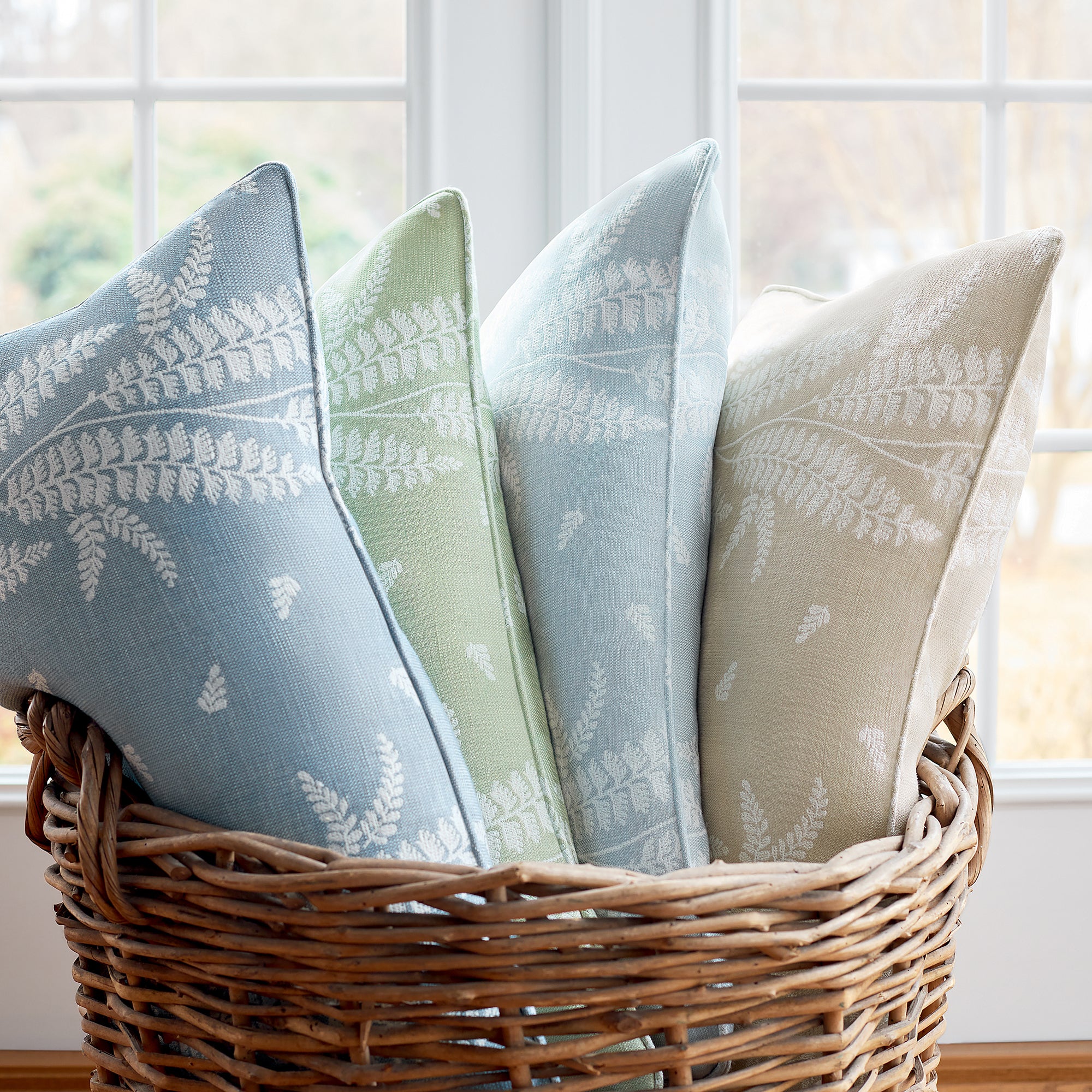 Collection of pillow fabrics in Ensbury Fern woven fabric featuring soft blue color fabric - pattern number AW57825 - by Anna French in the Bristol collection