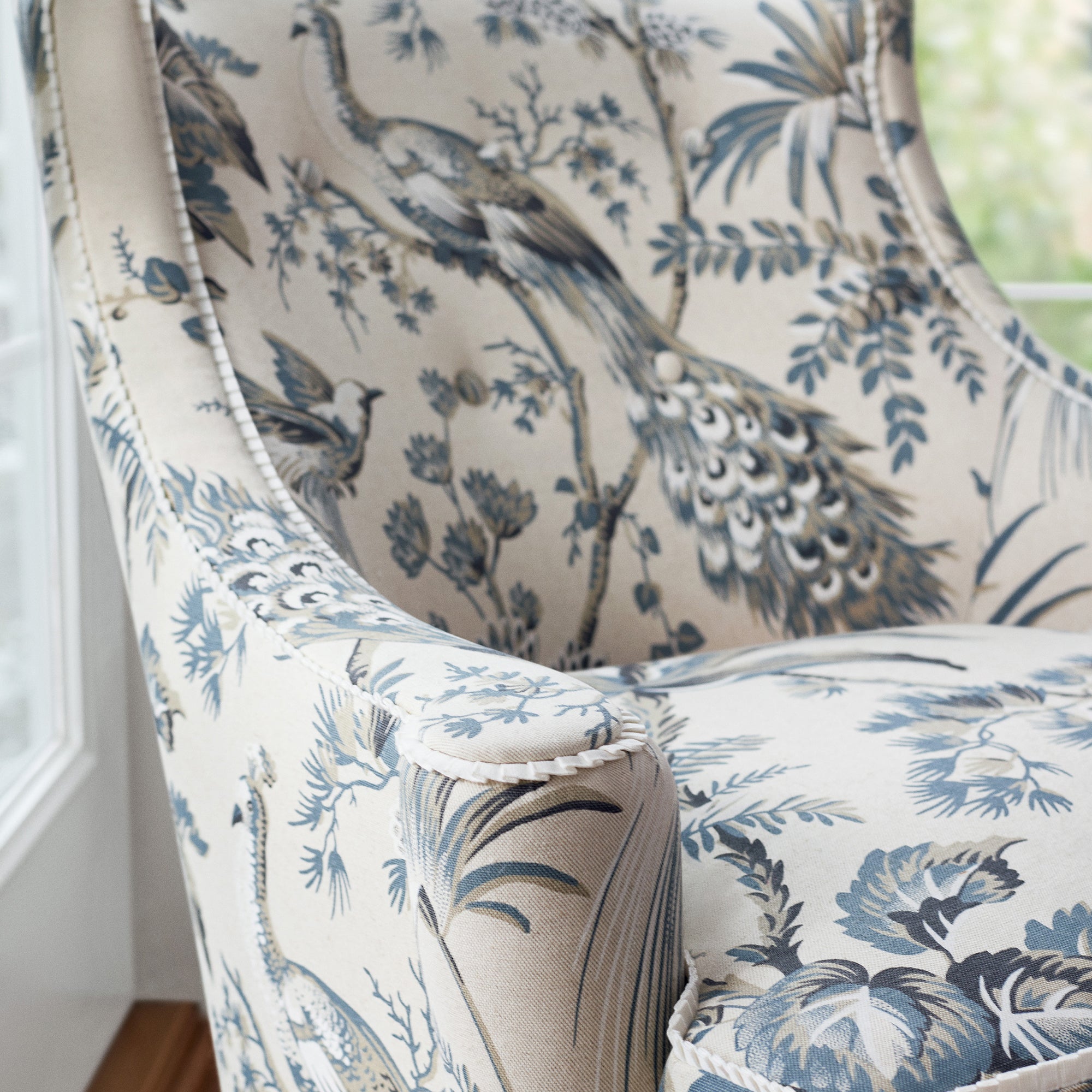 Detailed Peacock Toile printed fabric in slate and black color, pattern number AF57833 of the Anna French Bristol collection