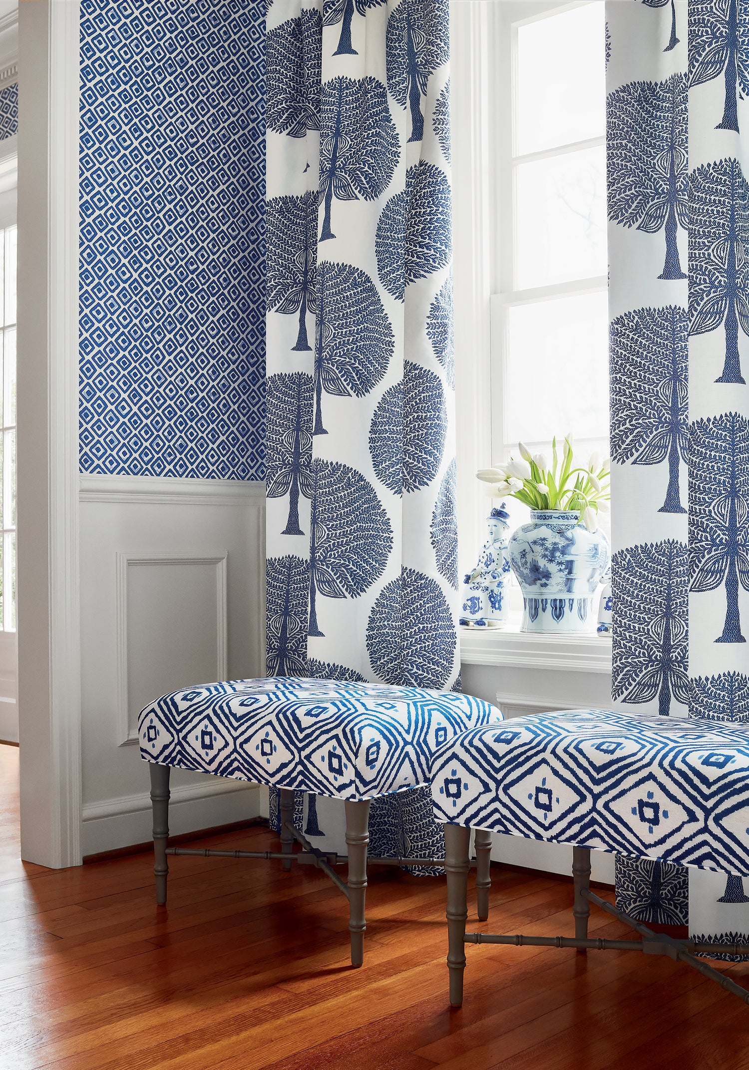 Living room with Drapery curtains made with Thibaut Mulberry Tree fabric in navy color - pattern number F910603