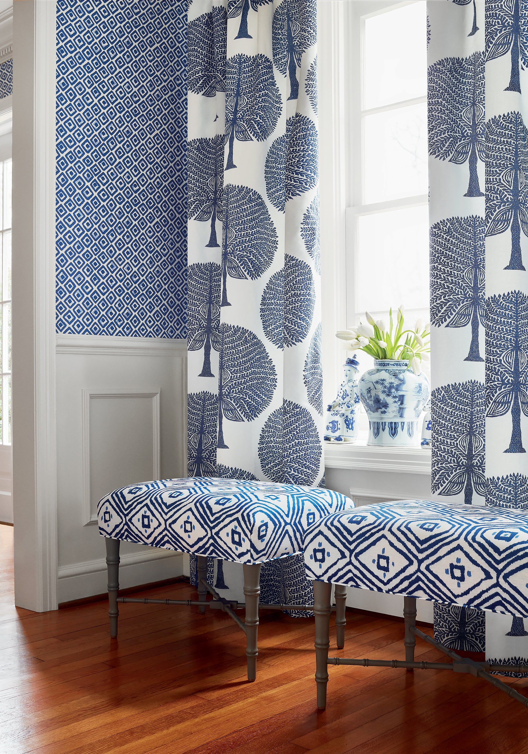 Living room with Drapery curtains made with Thibaut Mulberry Tree fabric in navy color - pattern number F910603