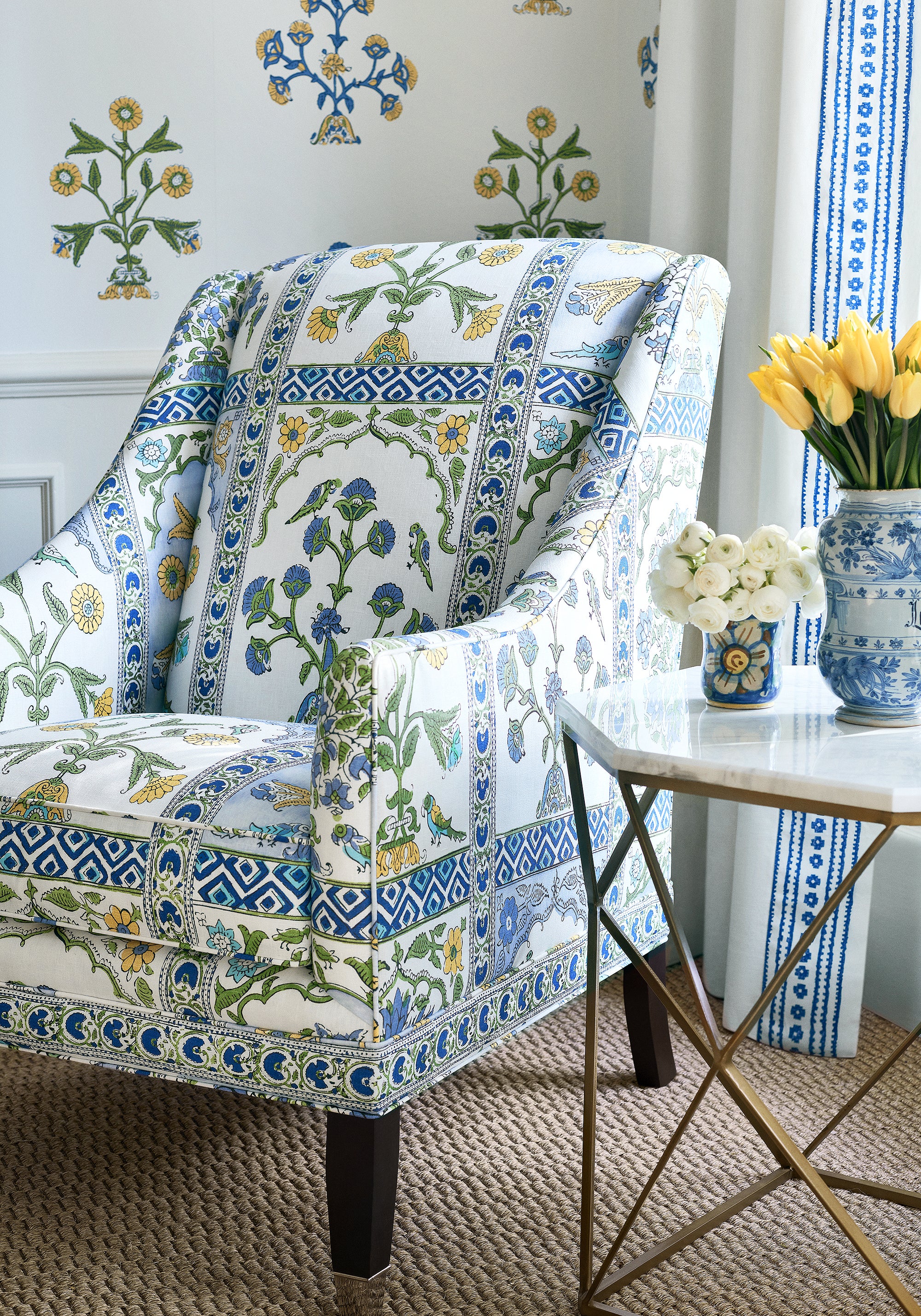 Angle view of Shelton Wing Chair in Thibaut Indian Panel printed fabric in Blue and Yellow color - pattern number F910628