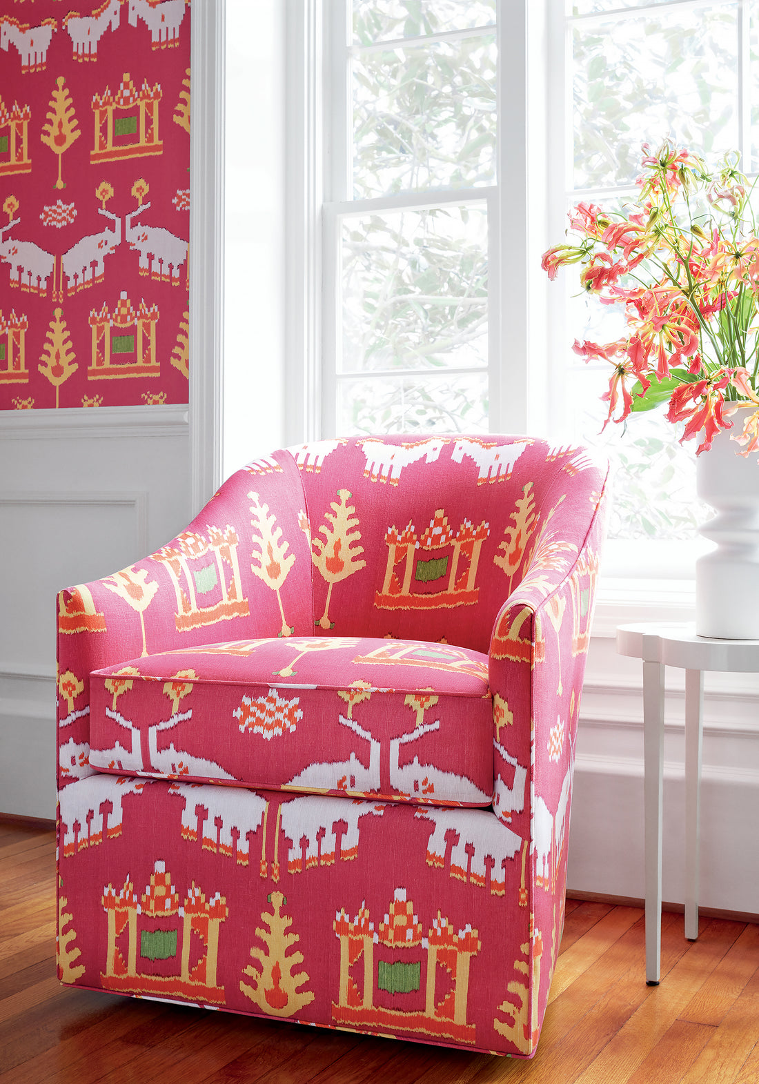 Harper chair upholstered with Thibaut Kingdom Parade printed fabric in Pink color - pattern number F910640