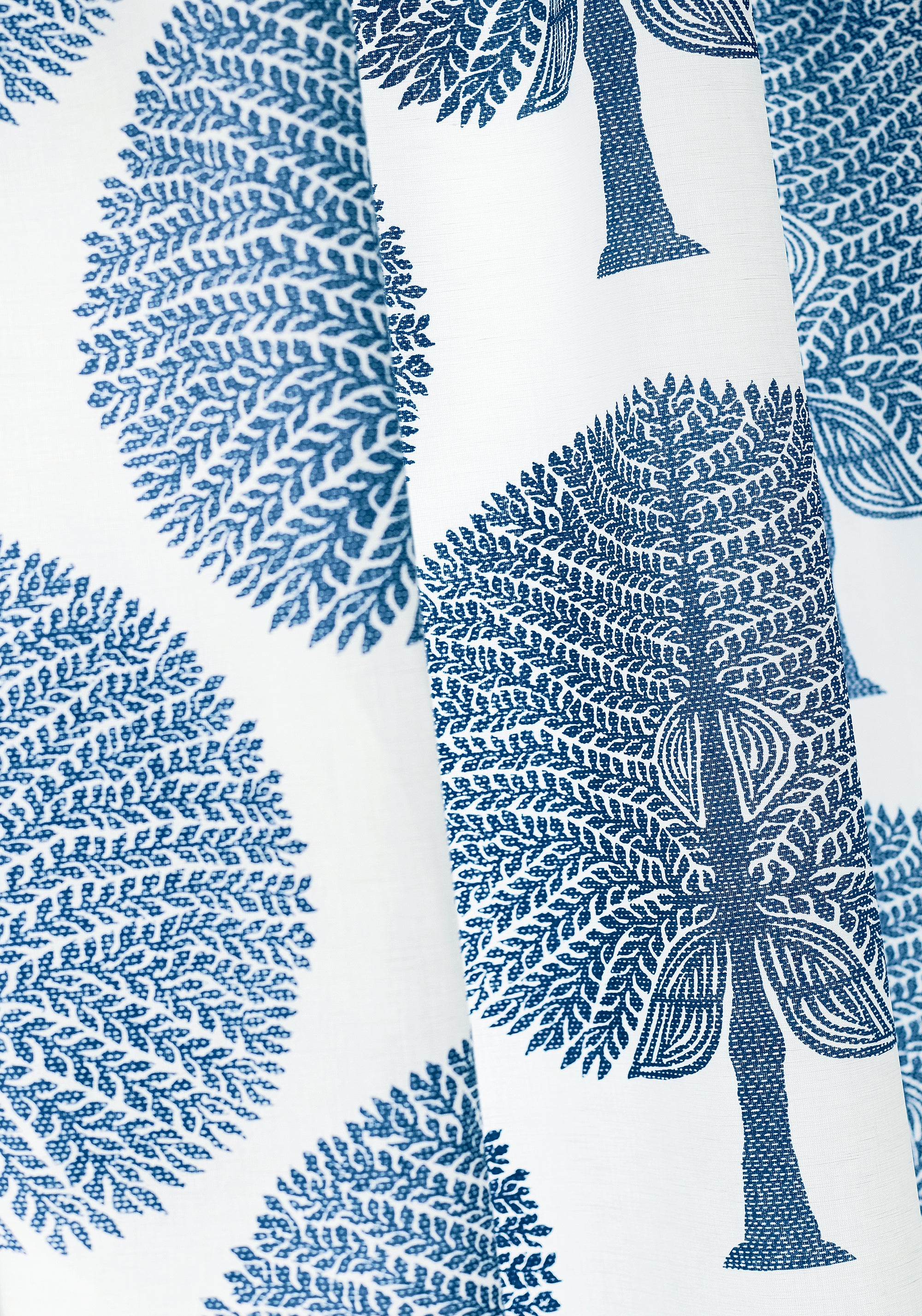 Close up detail of Thibaut Mulberry Tree fabric in navy color - pattern number F910603