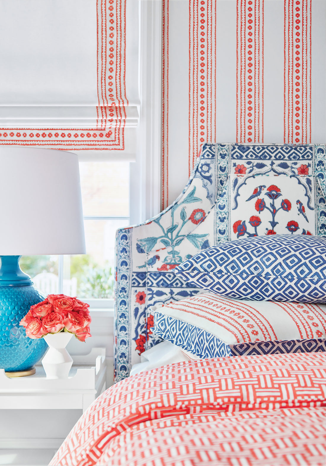 Ridgewood bed headboard upholstered with Thibaut Indian Panel printed fabric in Coral and Blue color - pattern number F910631