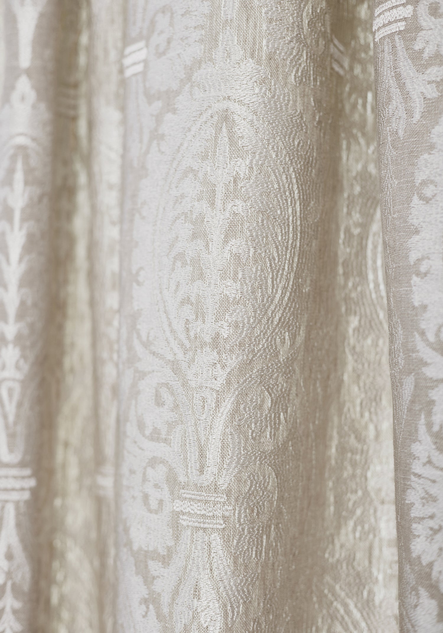 Detailed view of Sir Thomas Embroidery woven fabric in flax color variant by Thibaut in the Chestnut Hill collection - pattern number W772569